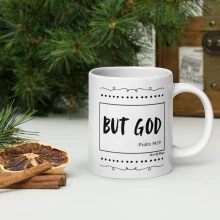 But GOD White glossy mug