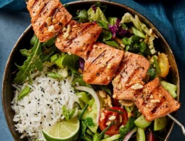 CHAR-GRILLED SALMON RICE BOWL WITH PEANUT SAUCE