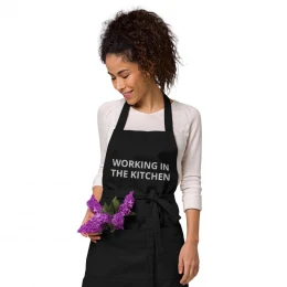 Organic cotton 'WORKING IN THE KITCHEN' apron