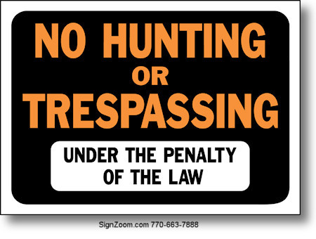 NO HUNTING OR TRESPASSING UNDER THE PENALTY OF THE LAW Sign