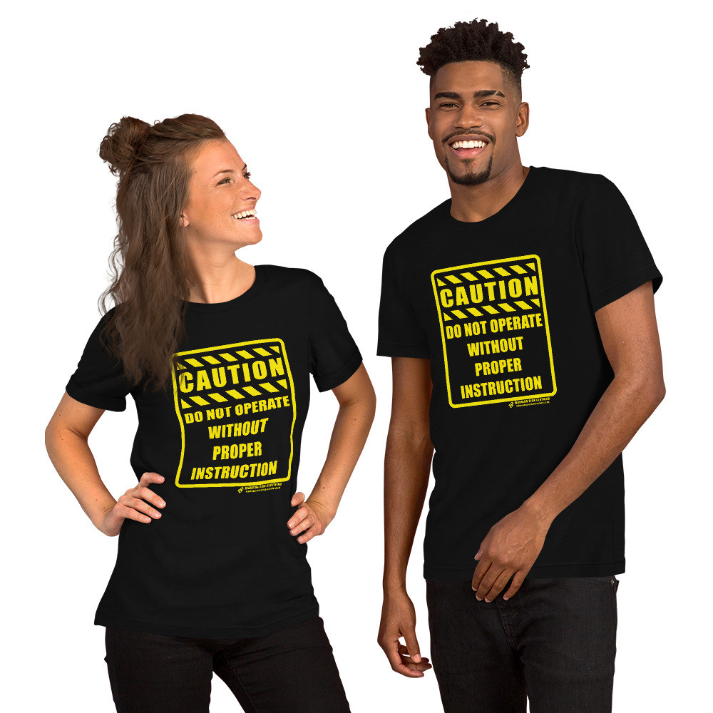CAUTION - DO NOT OPERATE WITHOUT PROPER INSTRUCTION - SHORT-SLEEVE UNISEX T-SHIRT