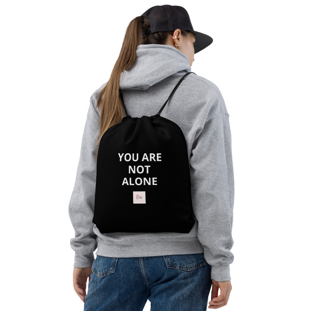 You Are Not Alone Drawstring bag
